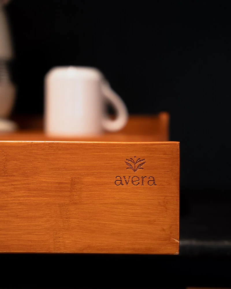 An Avera coffee mug on a wooden tray